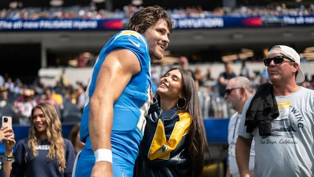 Madison Beer and Justin Herbert Celebrate Engagement in Garden Photos